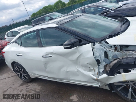 2018 Nissan Maxima SL with VIN 1N4AA6AP2JC395188, listed as a IAAI auction lot 42540832 with 106,898 mi miles and . Bid and sale history available at DreamBid. Image 14.
