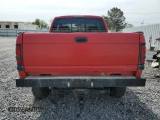2000 Dodge 2500 z VIN 1B7KF23Z6YJ187490, wystawiony jako Copart lot #57873375 z przebiegiem 238 769 mil mil oraz Szkody całkowita. Historia ofert i sprzedaży dostępna na DreamBid. Obrazek 6.