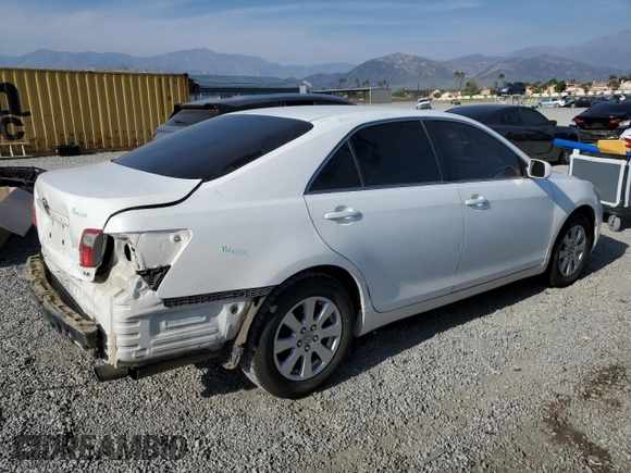 2007 Toyota Camry CE with VIN 4T1BE46K67U572411, listed as a Copart auction lot 54448655 with 290,790 mi miles and Salvage Title. Bid and sale history available at carsss.com. Image 3.
