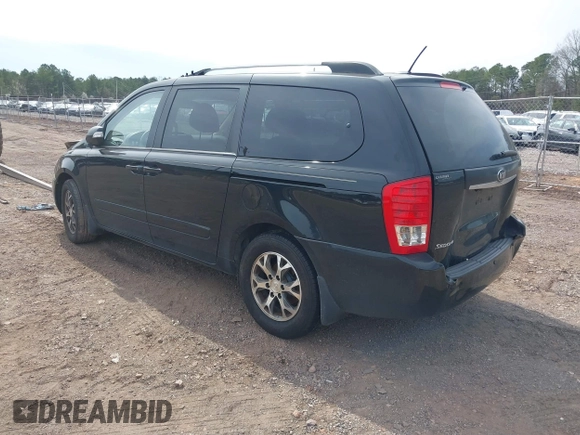 2014 Kia Sedona LX with VIN KNDMG4C7XE6586613, listed as a IAAI auction lot 41597187 with 211,851 mi miles. Bid and sale history available at carsss.com. Image 3.