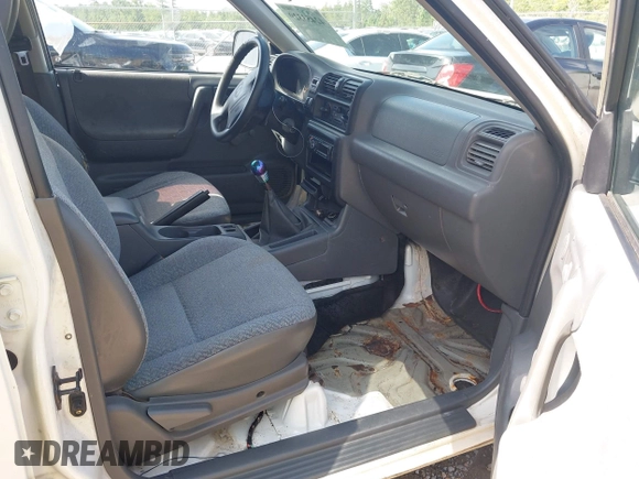 1998 Isuzu Rodeo with VIN 4S2CK58D3W4301606, listed as a IAAI auction lot 42453329 with 219,433 mi miles and . Bid and sale history available at DreamBid. Image 5.