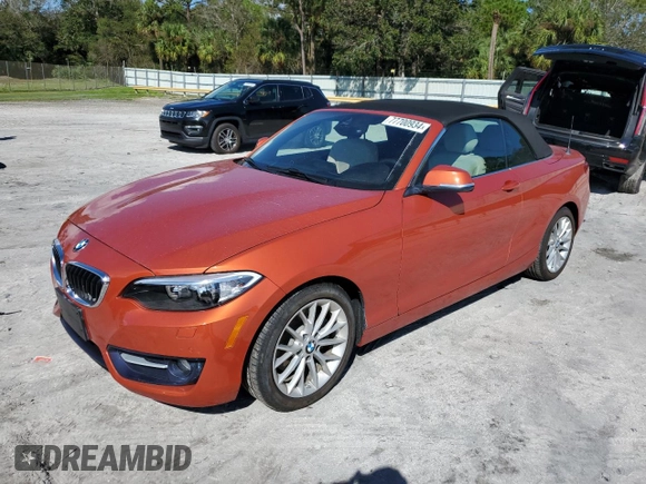2016 BMW 2 Series 228i with VIN WBA1K9C50GV710942, listed as a Copart auction lot 77700934 with 28,643 mi miles and Salvage Title. Bid and sale history available at carsss.com. Image 1.