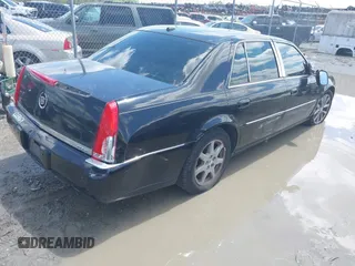 2006 Cadillac DTS 1SE with VIN 1G6KD57976U126634, listed as a IAAI auction lot 41972104 with 148,992 mi miles and . Bid and sale history available at DreamBid. Image 4.