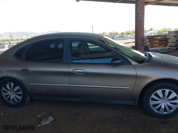 2002 Ford Taurus LX with VIN 1FAFP52U72G284116, listed as a IAAI auction lot 42004075 with 86,544 mi miles. Bid and sale history available at carsss.com. Image 13.