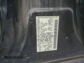 2007 Nissan Frontier Nismo z VIN 1N6AD07U87C437686, wystawiony jako Copart lot #55813325 z przebiegiem 199 594 mil mil oraz Szkody całkowita. Historia ofert i sprzedaży dostępna na DreamBid. Obrazek 13.