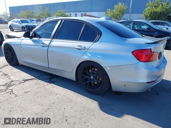 2015 BMW 3 Series 328i with VIN WBA3A5C57FF609054, listed as a IAAI auction lot 41330498 with 129,378 mi miles. Bid and sale history available at carsss.com. Image 3.