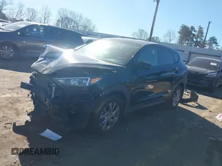 2021 Hyundai Tucson SE with VIN KM8J23A40MU334847, listed as a IAAI auction lot 41817556 with 63,000 mi miles and . Bid and sale history available at DreamBid. Image 17.