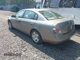 2002 Nissan Altima SL z VIN 1N4AL11D72C183312, wystawiony jako IAAI lot #42425412 z przebiegiem 167 195 mil mil oraz . Historia ofert i sprzedaży dostępna na DreamBid. Obrazek 3.