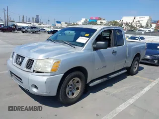 2006 Nissan Titan SE with VIN 1N6AA06A06N542516, listed as a IAAI auction lot 42736458 with 157,824 mi miles and . Bid and sale history available at DreamBid. Image 2.