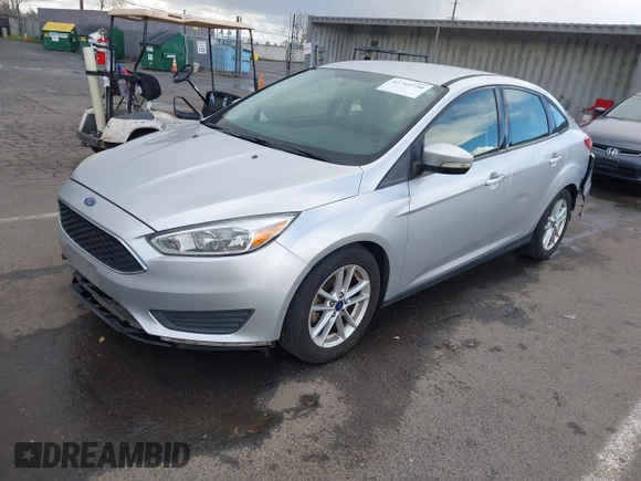 2016 Ford Focus SE with VIN 1FADP3F25GL384296, listed as a IAAI auction lot 41765750 with 158,695 mi miles. Bid and sale history available at carsss.com. Image 19.