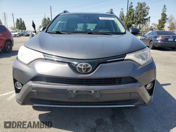2018 Toyota RAV4 XLE with VIN 2T3WFREVXJW439401, listed as a Copart auction lot 52359275 with 148,274 mi miles and Salvage Title. Bid and sale history available at carsss.com. Image 5.