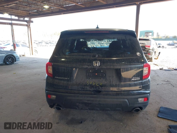 2021 Honda Passport Sport with VIN 5FNYF8H27MB021098, listed as a IAAI auction lot 41333241 with 101,239 mi miles and . Bid and sale history available at DreamBid. Image 16.