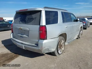2020 Chevrolet Tahoe LT with VIN 1GNSCBKC5LR226822, listed as a IAAI auction lot 41334853 with 77,091 mi miles. Bid and sale history available at carsss.com. Image 4.
