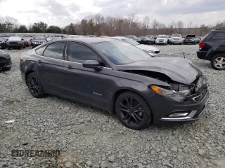 2018 Ford Fusion Hybrid SE with VIN 3FA6P0LU5JR241824, listed as a Copart auction lot 42303303 with 147,956 mi miles. Bid and sale history available at carsss.com. Image 4.