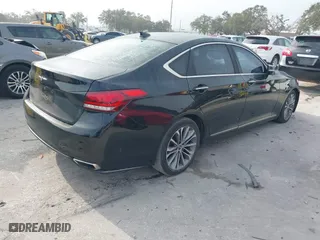 2016 Hyundai Genesis 3.8L with VIN KMHGN4JE7GU129448, listed as a IAAI auction lot 41456030 with 213,893 mi miles. Bid and sale history available at carsss.com. Image 4.