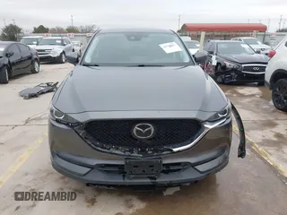 2021 Mazda CX-5 Touring with VIN JM3KFBCM0M0342210, listed as a IAAI auction lot 41236013 with 96,012 mi miles. Bid and sale history available at carsss.com. Image 13.