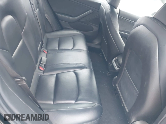2018 Tesla Model 3 Long Range Battery with VIN 5YJ3E1EA2JF071855, listed as a IAAI auction lot 41314974 with 169,318 mi miles and . Bid and sale history available at DreamBid. Image 8.