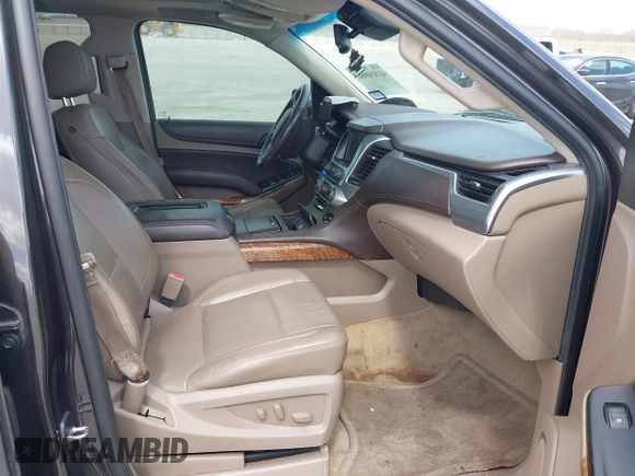 2015 Chevrolet Suburban LTZ with VIN 1GNSCKKC9FR500933, listed as a IAAI auction lot 41830980 with 169,217 mi miles and . Bid and sale history available at DreamBid. Image 5.