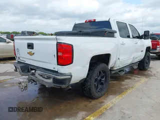 2017 Chevrolet Silverado 1500 LT with VIN 3GCPCREC6HG311064, listed as a IAAI auction lot 42026646 with 242,195 mi miles and . Bid and sale history available at DreamBid. Image 4.