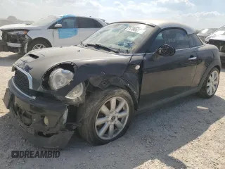 2012 MINI Coupe S z VIN WMWSX3C53CT154716, wystawiony jako Copart lot #71780654 z przebiegiem 101 260 mil mil oraz Szkody całkowita. Historia ofert i sprzedaży dostępna na DreamBid. Obrazek 1.