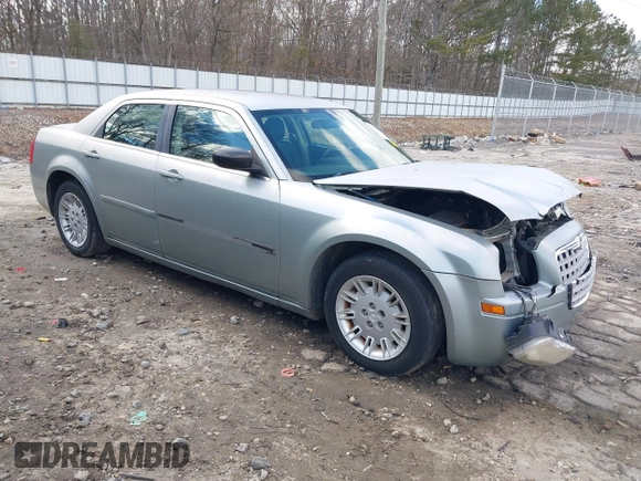 2005 Chrysler 300 with VIN 2C3JA43R05H137403, listed as a IAAI auction lot 41399519 with 135,044 mi miles. Bid and sale history available at carsss.com. Image 1.