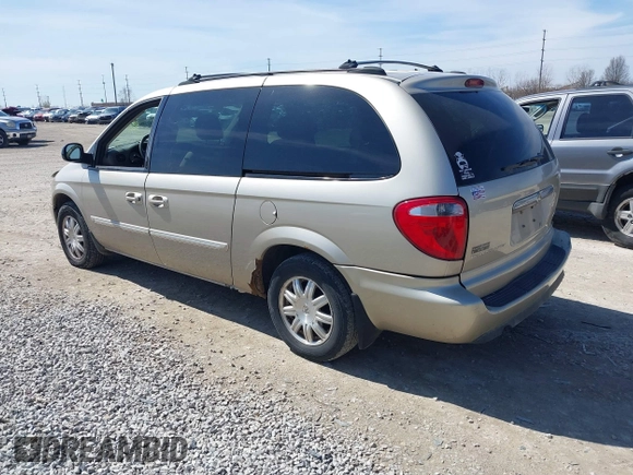 2005 Chrysler Town & Country Touring with VIN 2C4GP54LX5R132272, listed as a IAAI auction lot 41860741 with 138,402 mi miles and . Bid and sale history available at DreamBid. Image 3.