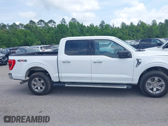 2022 Ford F-150 XL with VIN 1FTFW1E52NFB50568, listed as a IAAI auction lot 42061972 with 65,065 mi miles and . Bid and sale history available at DreamBid. Image 13.