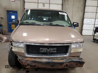 1999 GMC Safari z VIN 1GKEL19W6XB515307, wystawiony jako Copart lot #41521765 z przebiegiem 22 548 mil mil oraz Szkoda całkowita • Salvage title. Historia ofert i sprzedaży dostępna na DreamBid. Obrazek 5.