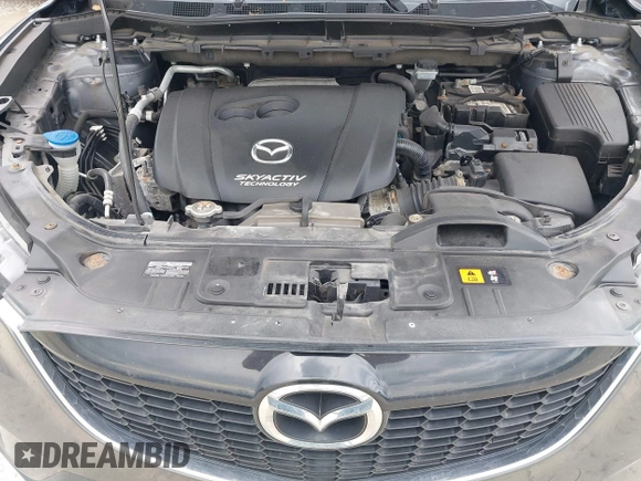 2014 Mazda CX-5 Sport z VIN JM3KE4BE6E0404753, wystawiony jako IAAI lot #42260554 z przebiegiem 144 688 mil mil oraz . Historia ofert i sprzedaży dostępna na DreamBid. Obrazek 10.