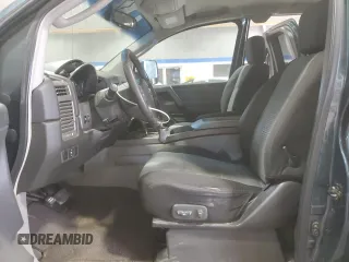 2004 Nissan Titan SE with VIN 1N6AA06B84N566360, listed as a Copart auction lot 57933105 with 133,066 mi miles and Salvage title. Bid and sale history available at DreamBid. Image 7.