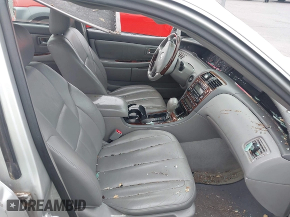 2003 Toyota Avalon XL with VIN 4T1BF28B83U307465, listed as a IAAI auction lot 42162357 with 173,681 mi miles and . Bid and sale history available at DreamBid. Image 5.