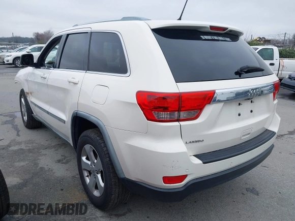 2011 Jeep Grand Cherokee Laredo with VIN 1J4RS4GG2BC709861, listed as a IAAI auction lot 41570812 with 178,226 mi miles and . Bid and sale history available at DreamBid. Image 3.