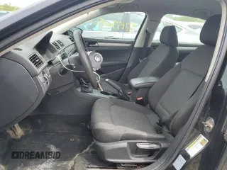 2012 Volkswagen Passat S with VIN 1VWAP7A38CC084490, listed as a Copart auction lot 57155005 with 243,113 mi miles and Salvage title. Bid and sale history available at DreamBid. Image 7.