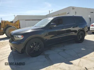2017 Dodge Durango R/T with VIN 1C4SDHCT0HC789424, listed as a Copart auction lot 57357105 with 119,017 mi miles and Salvage title. Bid and sale history available at DreamBid. Image 1.