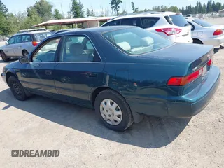 1997 Toyota Camry LE with VIN JT2BG22K5V0073783, listed as a IAAI auction lot 42409561 with 149,560 mi miles and . Bid and sale history available at DreamBid. Image 3.