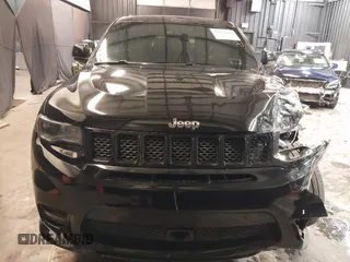 2017 Jeep Grand Cherokee SRT with VIN 1C4RJFDJ9HC819478, listed as a IAAI auction lot 41325490 with 63,551 mi miles. Bid and sale history available at carsss.com. Image 12.