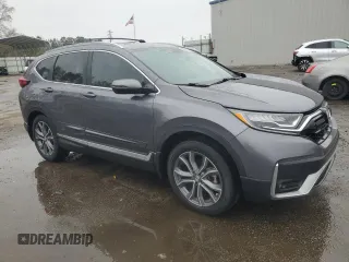 2021 Honda CR-V Touring with VIN 2HKRW1H96MH420465, listed as a Copart auction lot 86885384 with 61,699 mi miles and Salvage Title. Bid and sale history available at carsss.com. Image 4.