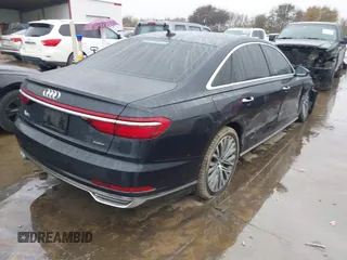 2019 Audi A8 L with VIN WAU8DAF82KN004676, listed as a IAAI auction lot 41086272 with 58,217 mi miles. Bid and sale history available at carsss.com. Image 4.