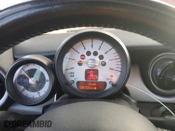 2012 MINI Convertible z VIN WMWZN3C57CT265368, wystawiony jako Copart lot #87100414 z przebiegiem 124 102 mil mil oraz Szkoda całkowita • Salvage title. Historia ofert i sprzedaży dostępna na DreamBid. Obrazek 9.