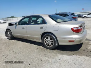2000 Mazda Millenia with VIN JM1TA2210Y1614967, listed as a Copart auction lot 53606185 with 120,288 mi miles and Salvage Title. Bid and sale history available at DreamBid. Image 2.