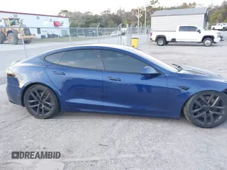 2023 Tesla Model S with VIN 5YJSA1E53PF518986, listed as a IAAI auction lot 41223046 with 22,204 mi miles and . Bid and sale history available at DreamBid. Image 14.