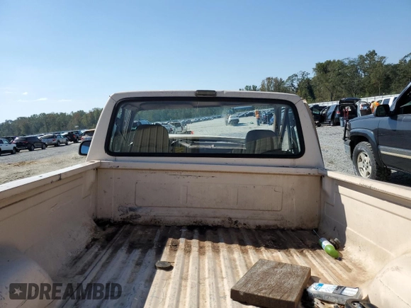 1992 Ford F-150 z VIN 1FTDF15NXNNA61991, wystawiony jako Copart lot #73393234 z przebiegiem Nie podano mil oraz Szkoda całkowita • Salvage title. Historia ofert i sprzedaży dostępna na DreamBid. Obrazek 10.