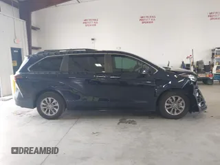 2023 Toyota Sienna XLE with VIN 5TDYRKEC2PS145751, listed as a IAAI auction lot 42661436 with 26,827 mi miles and . Bid and sale history available at DreamBid. Image 13.