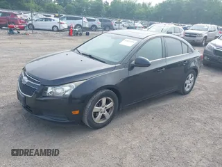 2014 Chevrolet Cruze 1LT with VIN 1G1PC5SB0E7291575, listed as a IAAI auction lot 42417379 with 111,705 mi miles and . Bid and sale history available at DreamBid. Image 2.