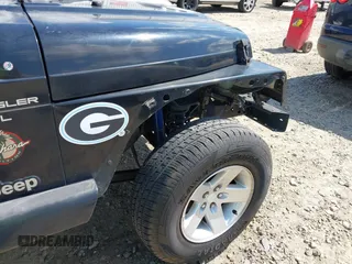 1998 Jeep Wrangler SE with VIN 1J4FY29P5WP793305, listed as a IAAI auction lot 42653372 with 190,047 mi miles and . Bid and sale history available at DreamBid. Image 12.