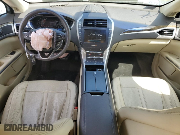 2014 Lincoln MKZ z VIN 3LN6L2JK4ER805421, wystawiony jako Copart lot #56781605 z przebiegiem 90 061 mil mil oraz Tytuł czysty. Historia ofert i sprzedaży dostępna na DreamBid. Obrazek 8.