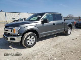 2020 Ford F-150 XL with VIN 1FTEW1C4XLFA23862, listed as a Copart auction lot 45156215 with 104,872 mi miles and Salvage Title. Bid and sale history available at carsss.com. Image 1.