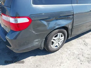 2005 Honda Odyssey TOURING with VIN 5FNRL38885B082482, listed as a IAAI auction lot 41879897 with 159,667 mi miles. Bid and sale history available at carsss.com. Image 6.