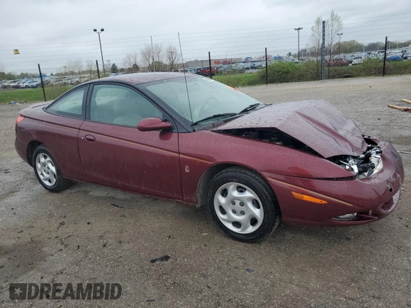 2002 Saturn SC z VIN 1G8ZY12732Z176596, wystawiony jako Copart lot #50506894 z przebiegiem Nie podano mil oraz Szkody całkowita. Historia ofert i sprzedaży dostępna na DreamBid. Obrazek 4.