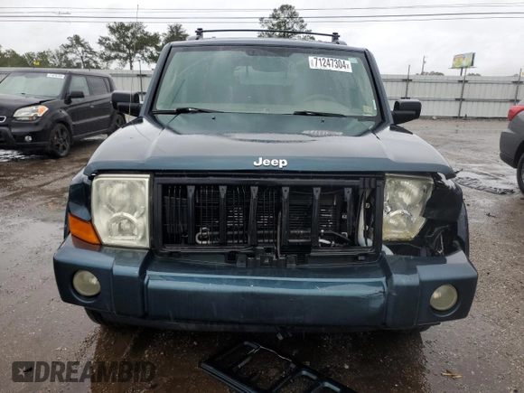2006 Jeep Commander with VIN 1J8HH48NX6C125803, listed as a Copart auction lot 71247304 with 214,297 mi miles and Salvage Title. Bid and sale history available at carsss.com. Image 5.